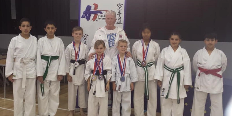 Sensei Fred posing with a group of students who had recently been awarded medals at the FEKO International Tournament.